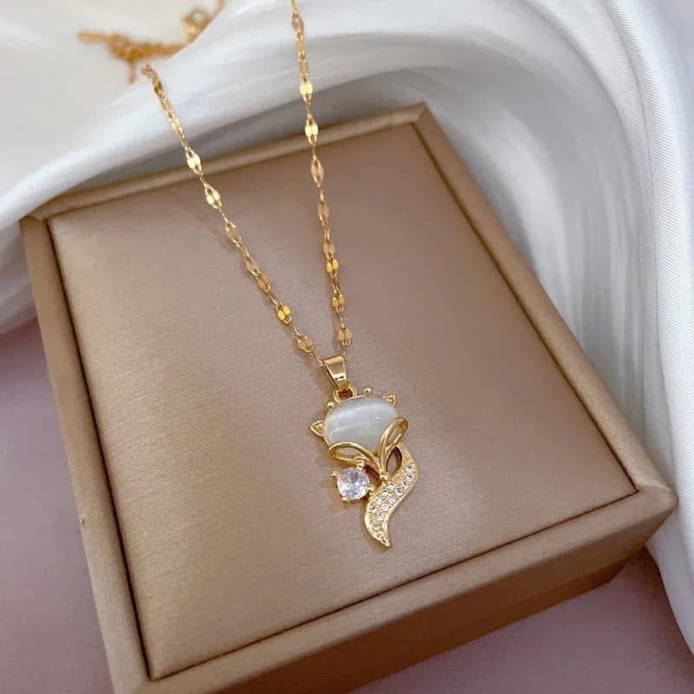 Elegant Gold and White Fox Pendant Necklace